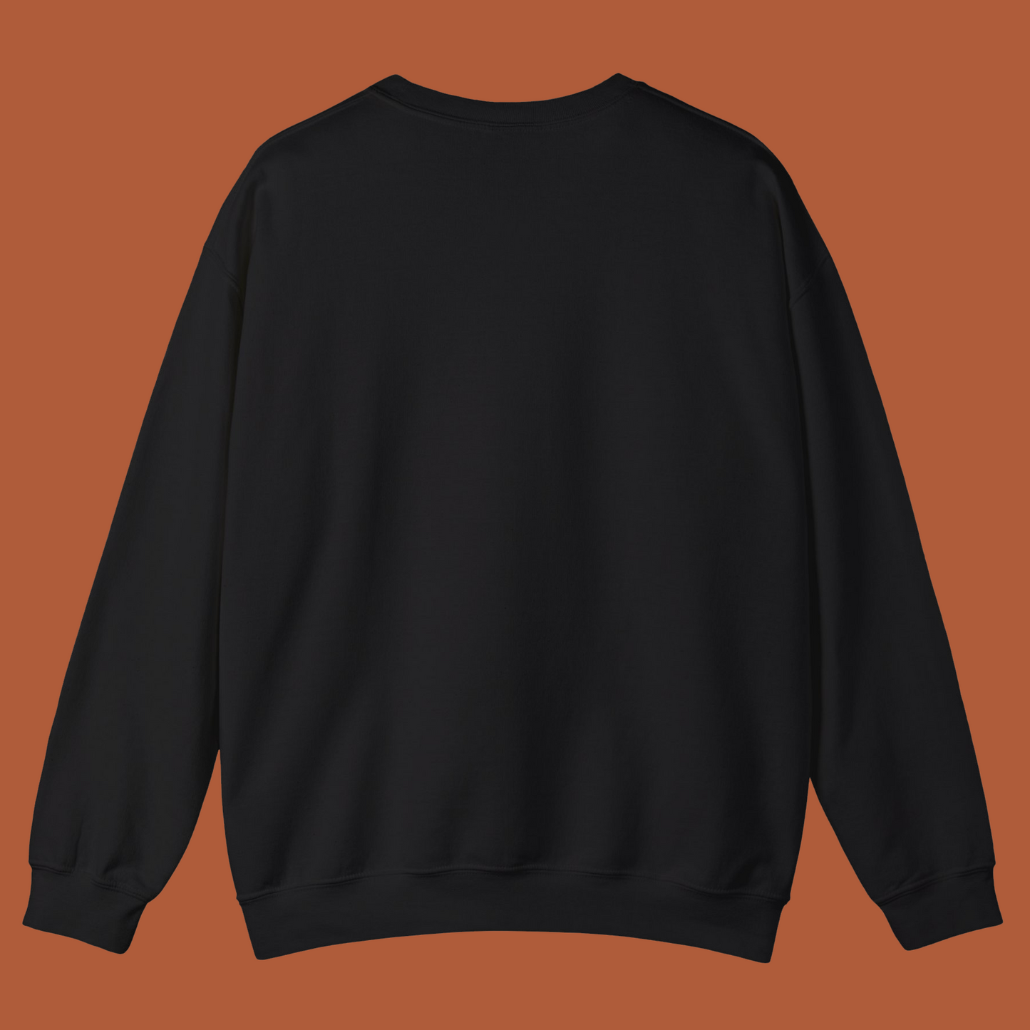 Black sweatshirt on a brown background