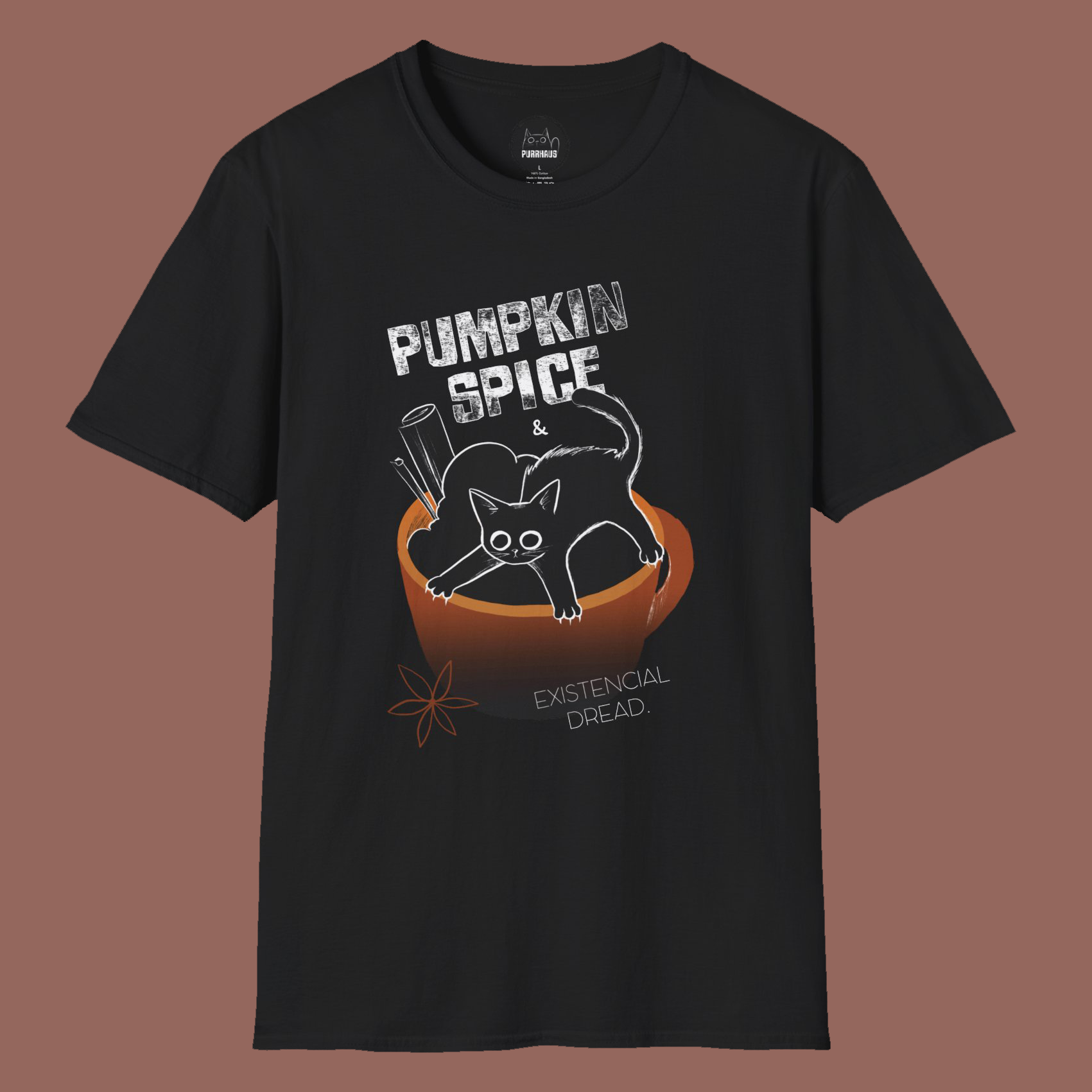 Black t-shirt with a graphic of a cat in a pumpkin and text on a brown background